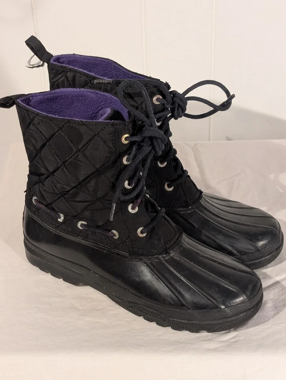 Sperry Black Quilted Duck Boots with Purple Lining